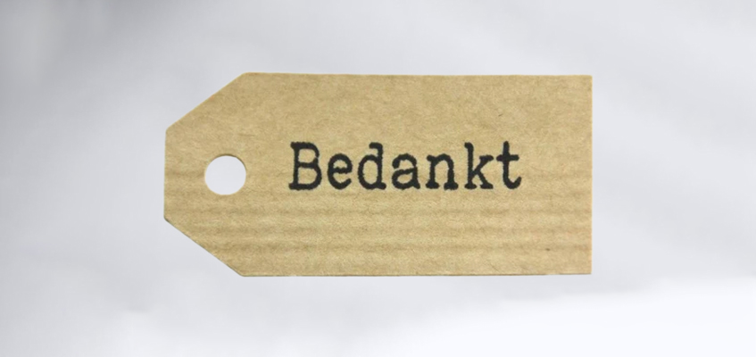 Kartonnen label met ‘Bedankt’ erop