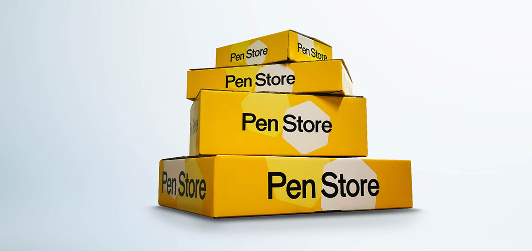 Pile of Pen Store yellow packaging boxes