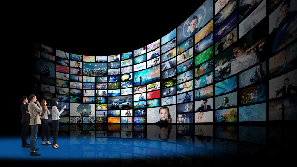 People captivated by the plurality of visual and digital media information